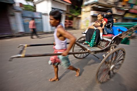RICKSHAW PULLER .